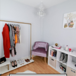 Stylish Blogger Home Office Ideas for the Fashion Influencer featured by top US Style Blogger, The Fashionista Momma; DIY rolling rack with purple chair and shelf.