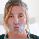 The perfect at home spa day featured by popular US Lifestyle blogger, The Fashionista Momma; woman with facial and eye pads for a spa day.