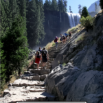 Things To Do For 4th Of July During Social Distancing featured by popular US Mom Blogger, The Fashionista Momma; people hiking at Vernal Falls, Yosemite.