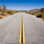 Best Tips To Road Trip With Kids featured by popular US family travel blogger, The Fashionista Momma; desert road in California.